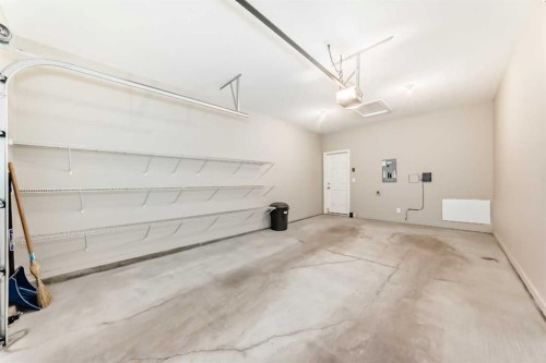 10 Sunvale Place Ne, High River, AB - Indoor Photo Showing Garage