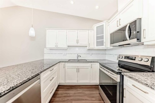 10 Sunvale Place Ne, High River, AB - Indoor Photo Showing Kitchen With Double Sink With Upgraded Kitchen