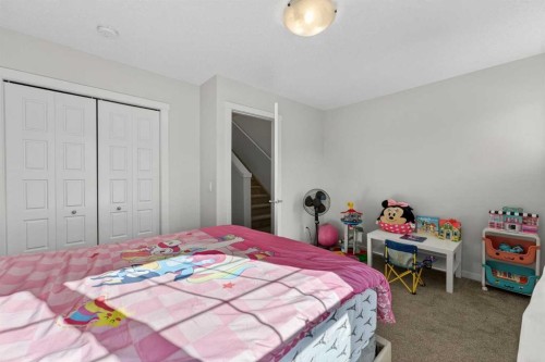340 Cranbrook Square Se, Calgary, AB - Indoor Photo Showing Bedroom