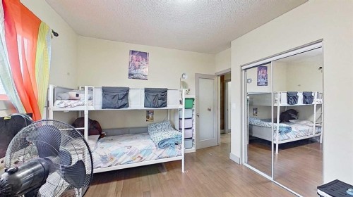 11723 Canfield Road Sw, Calgary, AB - Indoor Photo Showing Bedroom