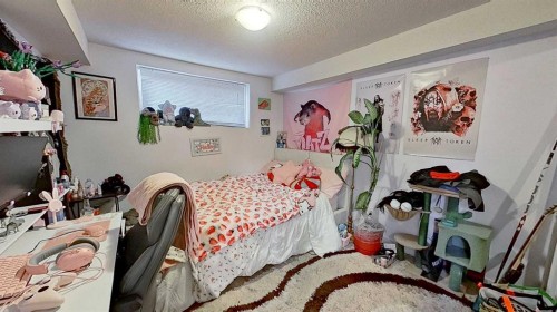 11723 Canfield Road Sw, Calgary, AB - Indoor Photo Showing Bedroom