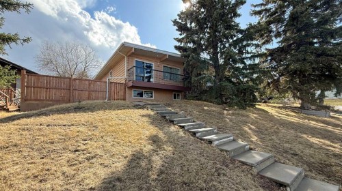 11723 Canfield Road Sw, Calgary, AB - Outdoor With Balcony
