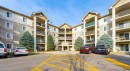 1406-12 Cimarron Common, Okotoks, AB  - Outdoor With Balcony With Facade 