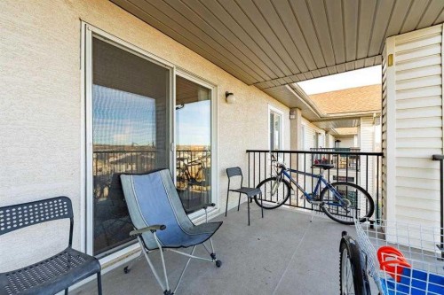 1406-12 Cimarron Common, Okotoks, AB - Outdoor With Deck Patio Veranda With Exterior