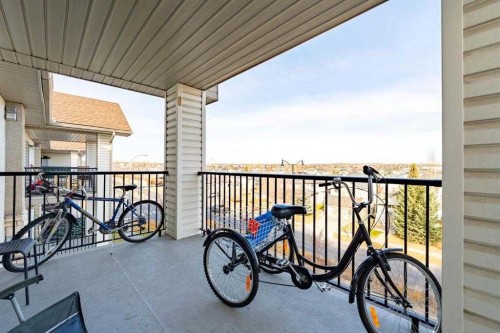 1406-12 Cimarron Common, Okotoks, AB - Outdoor With Balcony With Exterior