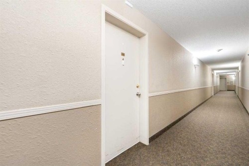 1406-12 Cimarron Common, Okotoks, AB - Indoor Photo Showing Other Room