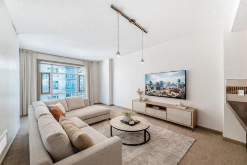 502-210 15 Avenue Se, Calgary, AB - Indoor Photo Showing Living Room