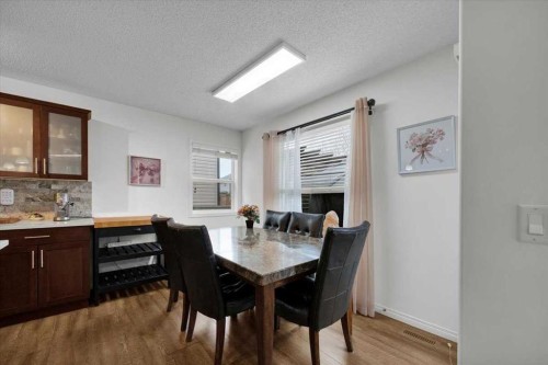 1009 Channelside Way Sw, Airdrie, AB - Indoor Photo Showing Dining Room