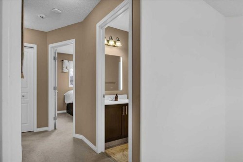 1009 Channelside Way Sw, Airdrie, AB - Indoor Photo Showing Bedroom