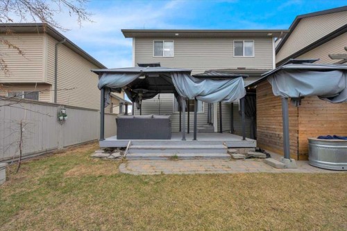 1009 Channelside Way Sw, Airdrie, AB - Outdoor With Deck Patio Veranda With Exterior