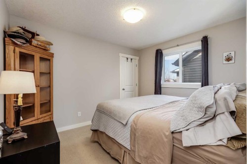 2 Elgin Meadows Green Se, Calgary, AB - Indoor Photo Showing Bedroom