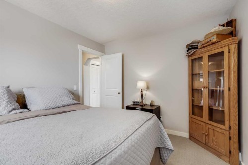 2 Elgin Meadows Green Se, Calgary, AB - Indoor Photo Showing Bedroom