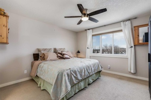 2 Elgin Meadows Green Se, Calgary, AB - Indoor Photo Showing Bedroom