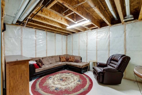 2 Elgin Meadows Green Se, Calgary, AB - Indoor Photo Showing Basement