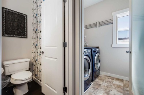 2 Elgin Meadows Green Se, Calgary, AB - Indoor Photo Showing Laundry Room
