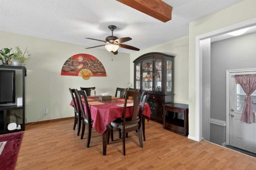 255 Penmeadows Close Se, Calgary, AB - Indoor Photo Showing Dining Room
