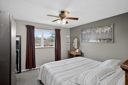 255 Penmeadows Close Se, Calgary, AB - Indoor Photo Showing Bedroom