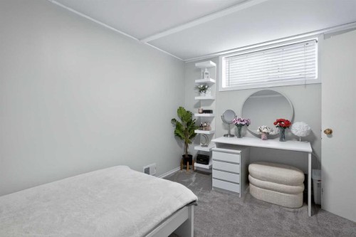 255 Penmeadows Close Se, Calgary, AB - Indoor Photo Showing Bedroom