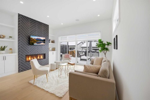 1712 18 Avenue Nw, Calgary, AB - Indoor Photo Showing Living Room With Fireplace