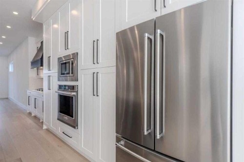 1712 18 Avenue Nw, Calgary, AB - Indoor Photo Showing Kitchen With Stainless Steel Kitchen
