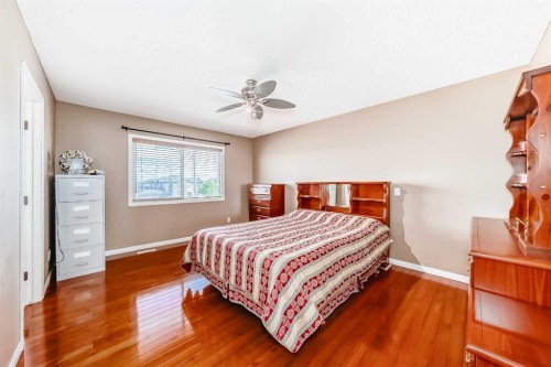 148 Saddlecrest Gardens Ne, Calgary, AB - Indoor Photo Showing Bedroom