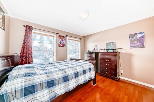 148 Saddlecrest Gardens Ne, Calgary, AB - Indoor Photo Showing Bedroom