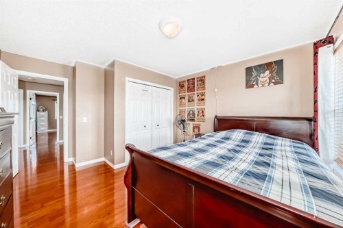 148 Saddlecrest Gardens Ne, Calgary, AB - Indoor Photo Showing Bedroom