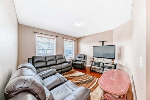 148 Saddlecrest Gardens Ne, Calgary, AB - Indoor Photo Showing Living Room