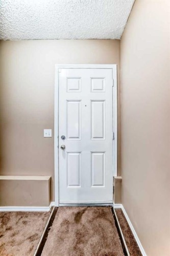 148 Saddlecrest Gardens Ne, Calgary, AB - Indoor Photo Showing Other Room