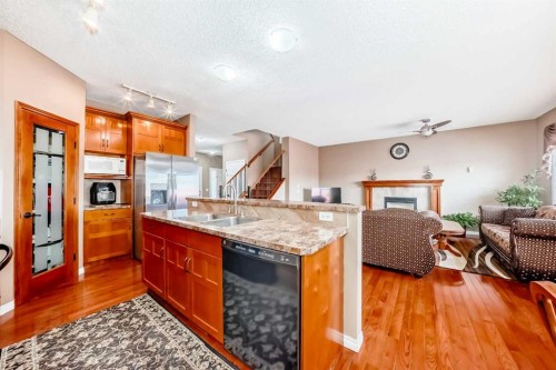 148 Saddlecrest Gardens Ne, Calgary, AB - Indoor Photo Showing Kitchen With Double Sink