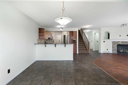 231 Hawkmere Road, Chestermere, AB - Indoor With Fireplace