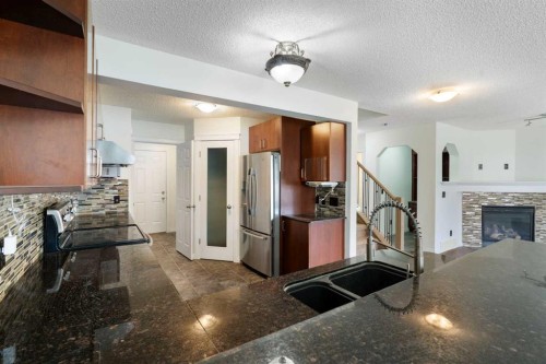 231 Hawkmere Road, Chestermere, AB - Indoor Photo Showing Kitchen With Double Sink