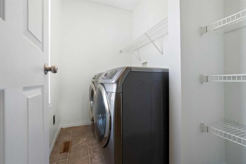 231 Hawkmere Road, Chestermere, AB - Indoor Photo Showing Laundry Room