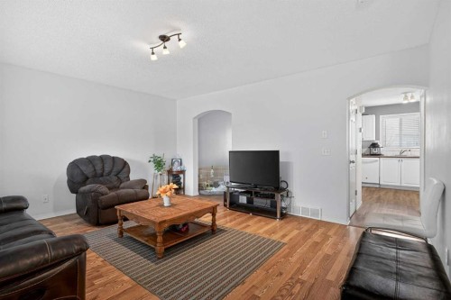 260 Stonemere Place, Chestermere, AB - Indoor Photo Showing Living Room