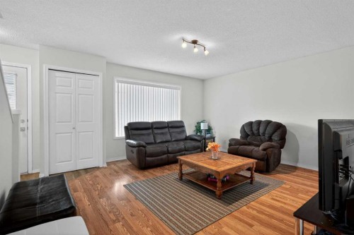 260 Stonemere Place, Chestermere, AB - Indoor Photo Showing Living Room