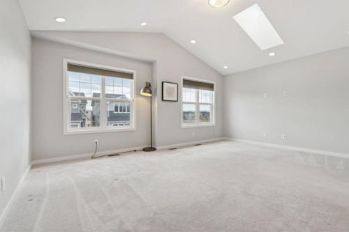 107 Sundown View, Cochrane, AB - Indoor Photo Showing Other Room