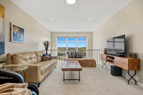 51 Creekstone Way Sw, Calgary, AB - Indoor Photo Showing Living Room
