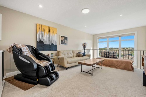 51 Creekstone Way Sw, Calgary, AB - Indoor Photo Showing Living Room