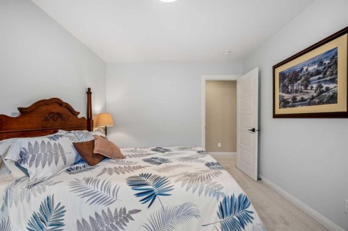 51 Creekstone Way Sw, Calgary, AB - Indoor Photo Showing Bedroom