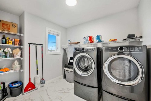 51 Creekstone Way Sw, Calgary, AB - Indoor Photo Showing Laundry Room