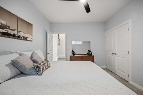 51 Creekstone Way Sw, Calgary, AB - Indoor Photo Showing Bedroom