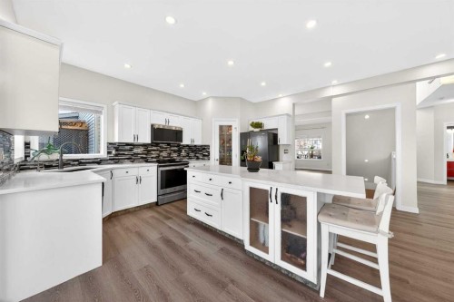 502 Panamount Boulevard Nw, Calgary, AB - Indoor Photo Showing Kitchen With Upgraded Kitchen