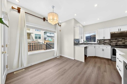 502 Panamount Boulevard Nw, Calgary, AB - Indoor Photo Showing Kitchen With Upgraded Kitchen