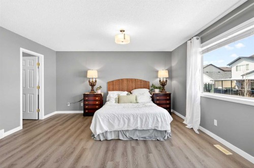 502 Panamount Boulevard Nw, Calgary, AB - Indoor Photo Showing Bedroom