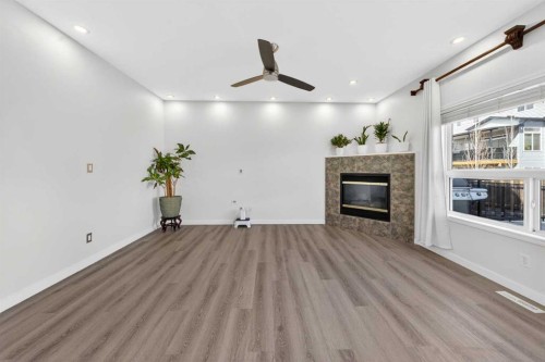 502 Panamount Boulevard Nw, Calgary, AB - Indoor With Fireplace