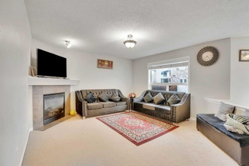 269 West Creek Boulevard, Chestermere, AB - Indoor Photo Showing Living Room With Fireplace