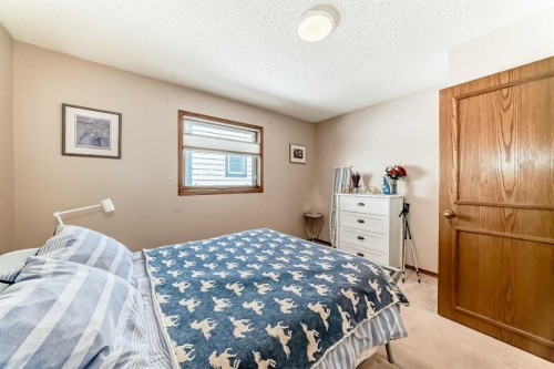 36 Shannon Road Sw, Calgary, AB - Indoor Photo Showing Bedroom