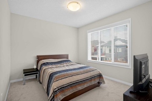 20 Mount Rae Terrace, Okotoks, AB - Indoor Photo Showing Bedroom