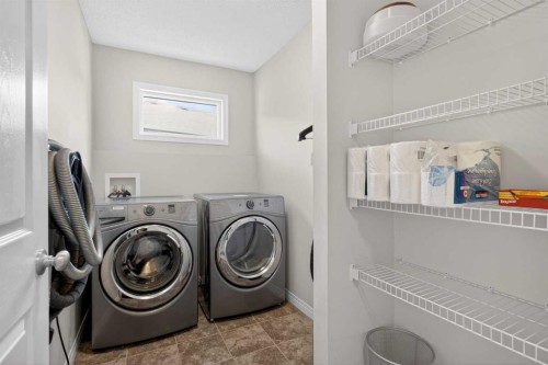 20 Mount Rae Terrace, Okotoks, AB - Indoor Photo Showing Laundry Room