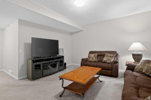20 Mount Rae Terrace, Okotoks, AB - Indoor Photo Showing Living Room